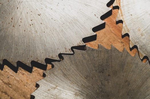 Circular saw blades. carpentry tools. industrial background. equipment for sawmill and sawing wooden products