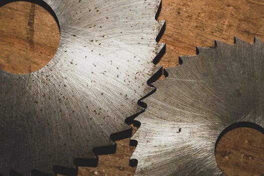 Circular saw blades. carpentry tools. industrial background. equipment for sawmill and sawing wooden products