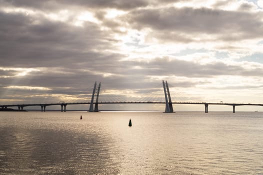 Bridge across the river on a cloudy day background