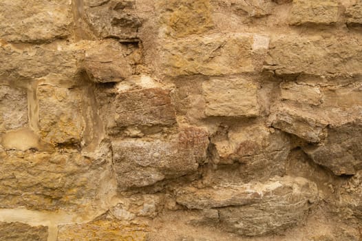 Rocky brick wall. stone wall background. abstract brown grunge texture. old masonry