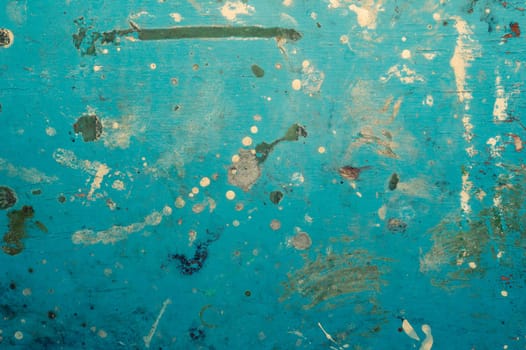 Abstract grunge blue background. texture with paint spots and scratches