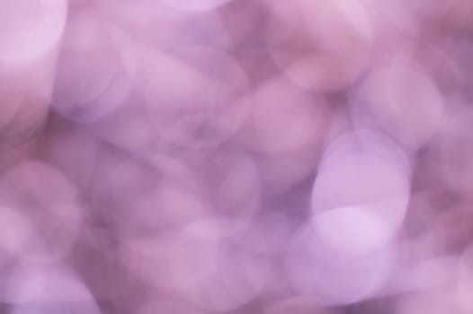 Abstract purple bokeh background. sparkle lights texture