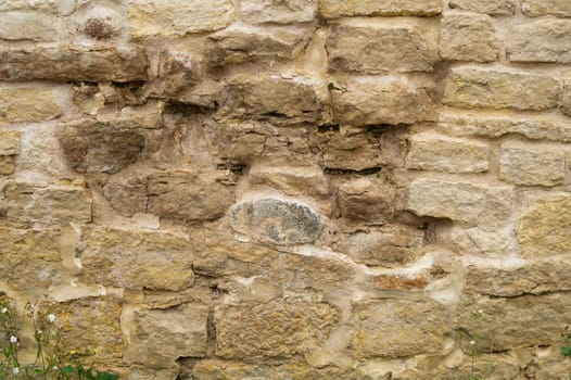 Rocky brick wall. stone wall background. abstract brown grunge texture. old masonry