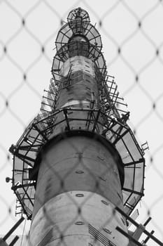 Telecommunication tower. high radio antenna. big metal construction black and white