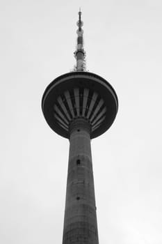 Telecommunication tower. high radio antenna. big metal construction black and white