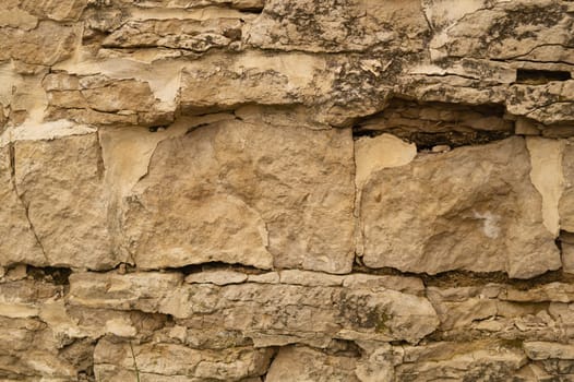 Rocky brick wall. stone wall background. abstract brown grunge texture. old masonry