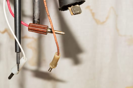 Old electrical probes hanging in the workshop. multimeter probe