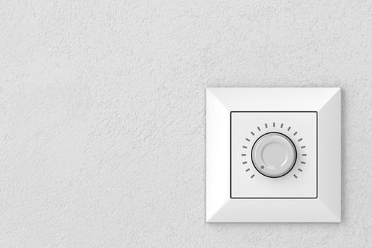 Dimmer light switch on a wall