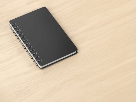Spiral notebook on wooden desk