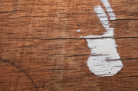 Rough wood with white paint spots. old wooden texture. scratched and cracked surface