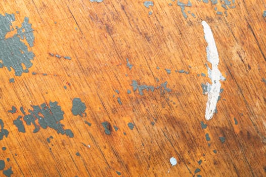 Rough wood with paint spots. old wooden texture. cracked and scratched surface