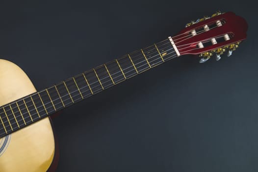 Guitar close up. musical instrument. strings on the guitar fretboard