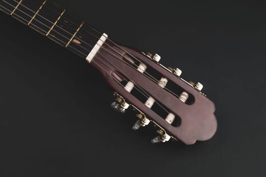 Guitar fretboard close up. musical instrument. strings on the guitar neck. copy space
