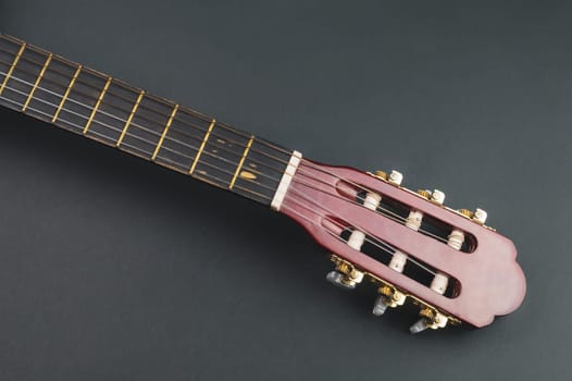 Guitar fretboard close up. musical instrument. strings on the guitar neck. copy space