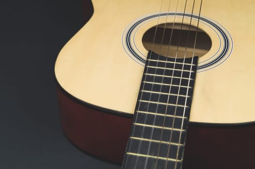 Guitar close up. musical instrument. strings on the guitar fretboard