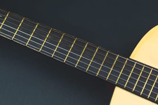 Guitar close up. musical instrument. strings on the guitar fretboard