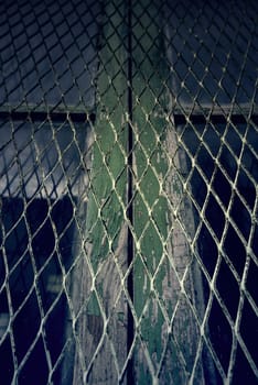 Detail of metal protection fence decorated, painted steel with shapes