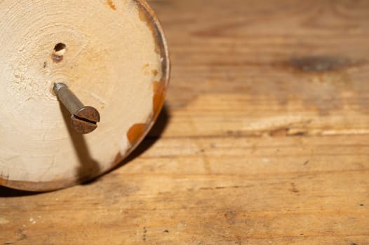 Old screw in wood close up. carpentry work background