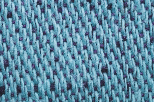 Blue fabric texture. knitted textile background. woven material close up