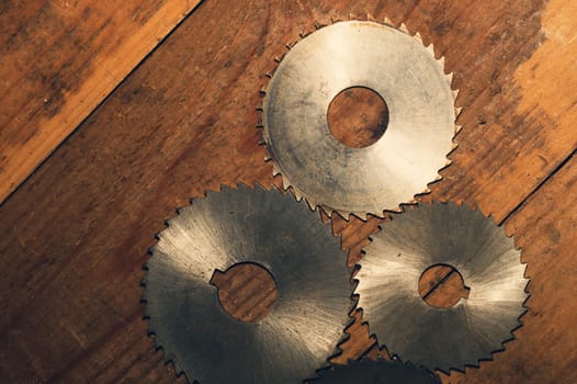 Circular saw blades. carpentry tools. industrial background. equipment for sawmill and sawing wooden products