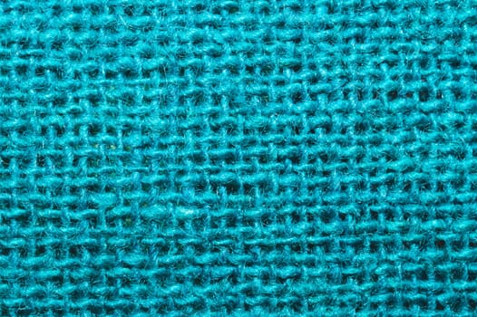 Blue fabric texture. knitted textile background. woven material close up