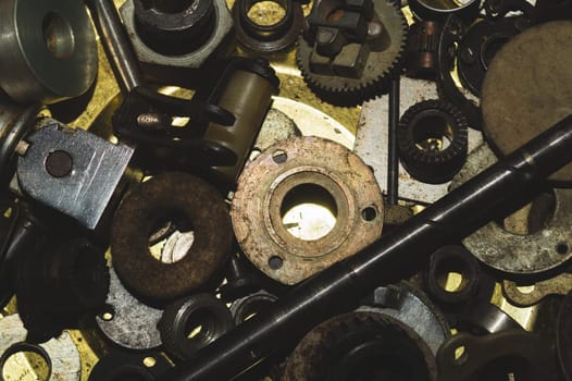 Pile of fasteners and screws close up. scrap metal. different metal parts