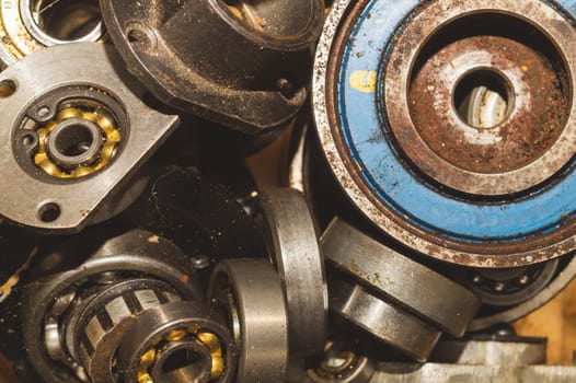 Metal bearings. pile of gears. scrap metal