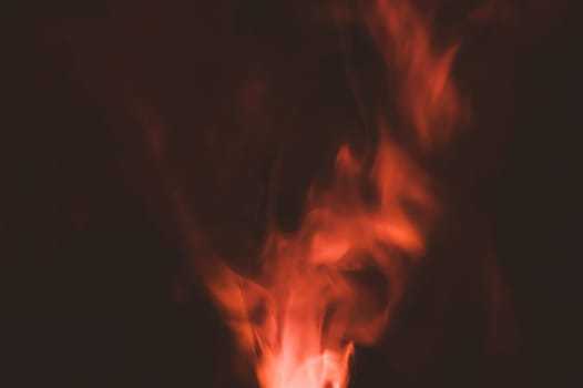 Colored smoke on black backdrop. brown fog abstract background