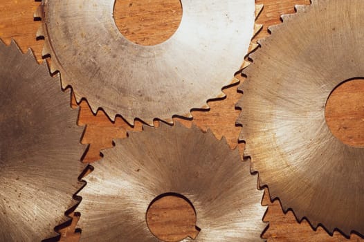 Circular saw blades. carpentry tools. industrial background. equipment for sawmill and sawing wooden products