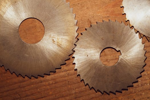 Circular saw blades. carpentry tools. industrial background. equipment for sawmill and sawing wooden products