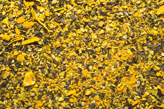 Curry spice background. curcuma seasoning. yellow condiment close up