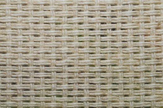 Fabric macro texture. knitted material close up. woven background. woolen textile