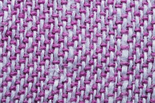 Pink fabric texture. knitted textile background. woven material close up