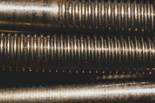 Steel screws close up. bolt thread. fasteners background. work tool