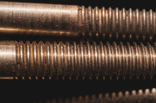 Steel screws close up. bolt thread. fasteners background. work tool