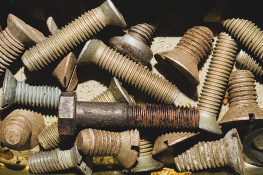 Bolts and nuts close up. fasteners background. work tool