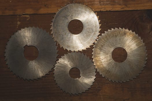 Circular saw blades. carpentry tools. industrial background. equipment for sawmill and sawing wooden products