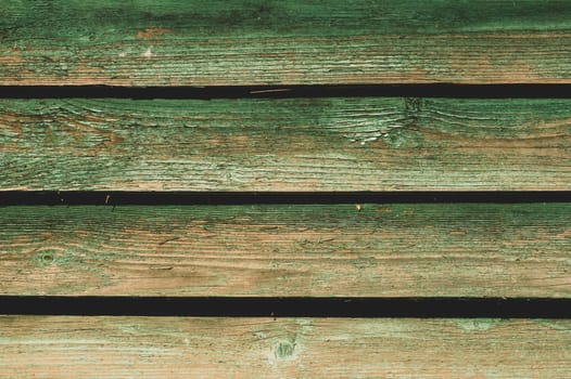 Colored wood texture. green wooden planks. shabby painted wood background