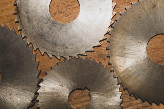 Circular saw blades. carpentry tools. industrial background. equipment for sawmill and sawing wooden products