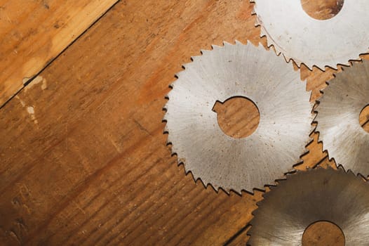 Circular saw blades. carpentry tools. industrial background. equipment for sawmill and sawing wooden products