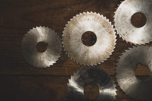 Circular saw blades. carpentry tools. industrial background. equipment for sawmill and sawing wooden products