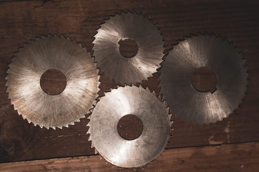 Circular saw blades. carpentry tools. industrial background. equipment for sawmill and sawing wooden products