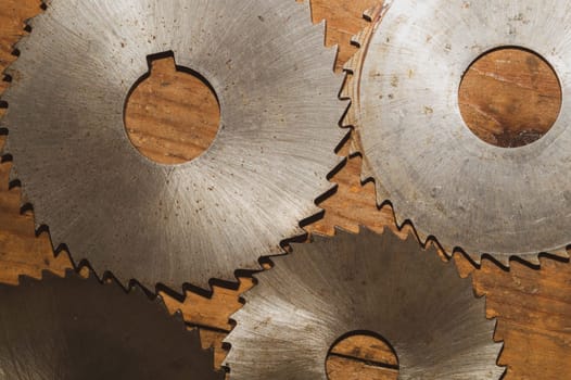 Circular saw blades. carpentry tools. industrial background. equipment for sawmill and sawing wooden products