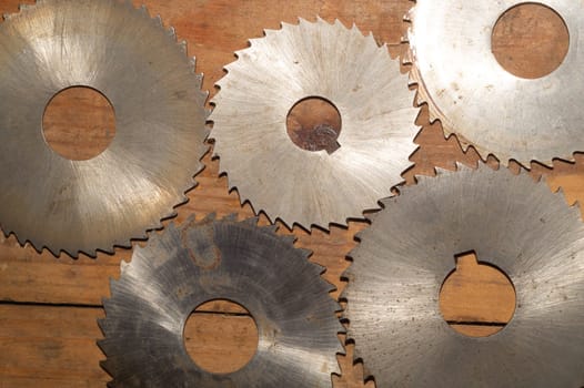 Circular saw blades. carpentry tools. industrial background. equipment for sawmill and sawing wooden products