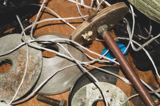 Various old rusty tools in the box. chaos of working things in workshop