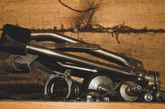 Various old tools in the workshop. chaos of working things. scrape metal