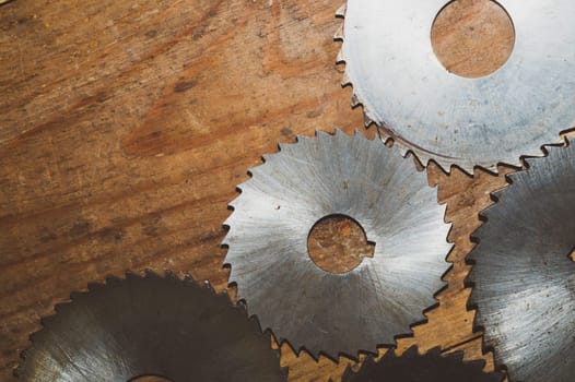 Circular saw blades. carpentry tools. industrial background. equipment for sawmill and sawing wooden products