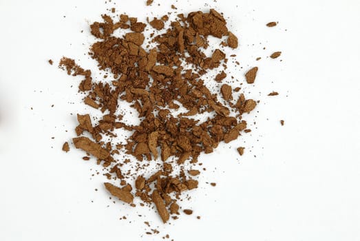pressed face powder on a white background