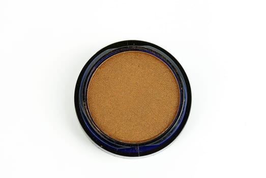 pressed face powder on a white background