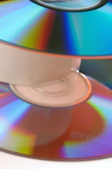 CDs and DVDs on a white background